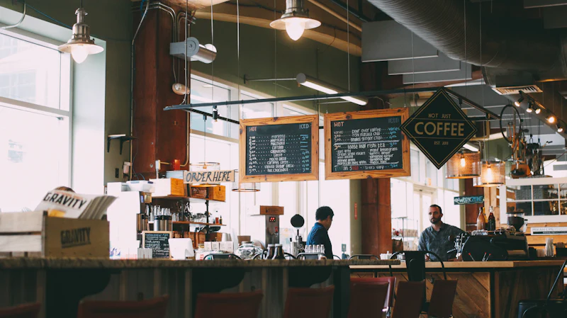 Café counter with a hand-lettered coffee board
