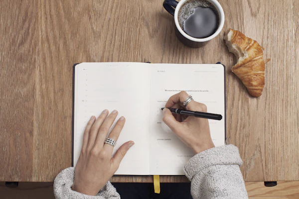 Journaling over a croissant and coffee